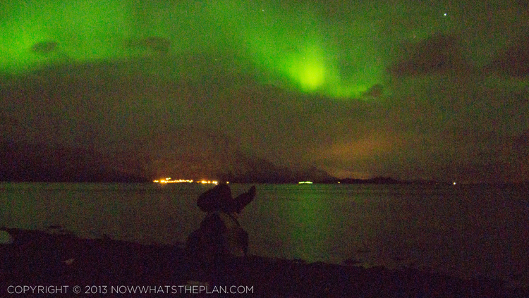 My husband pointing at the northern lights